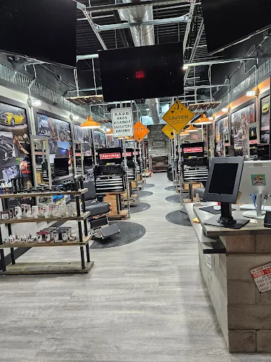 Garage theme barber shop interior of Hair Mechanix in Middleburg FL